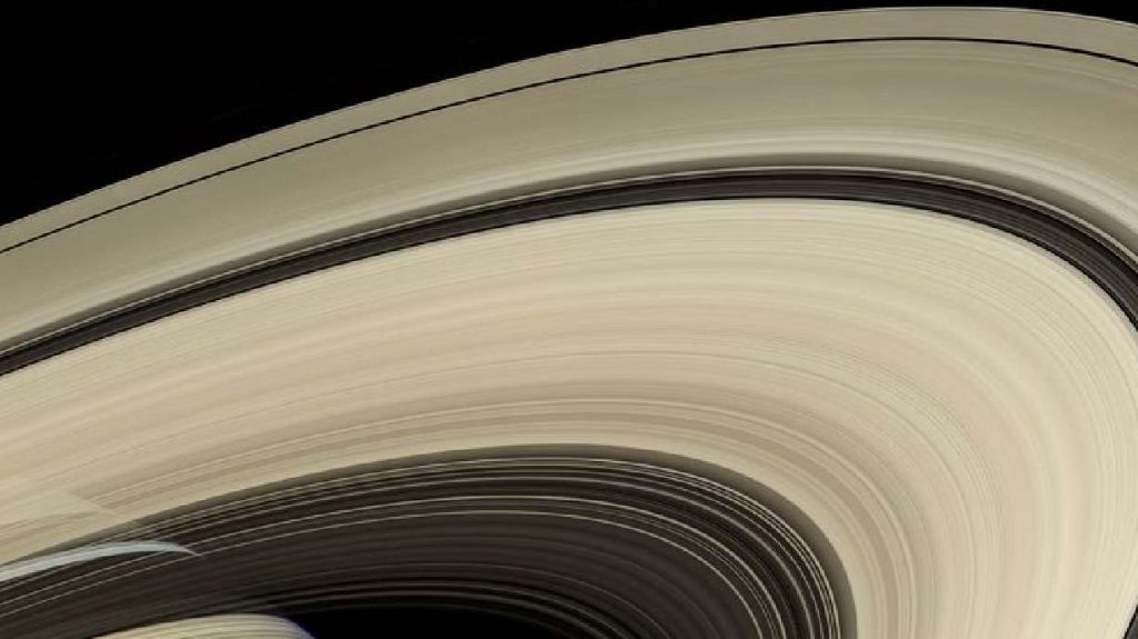 A view of Saturn from NASA's Hubble Space Telescope captures details of its ring system and atmospheric details June 20, 2019. Scientists said on Thursday the destruction of a large moon that strayed too close to Saturn would account both for the birth of the gas giant planet's magnificent rings.