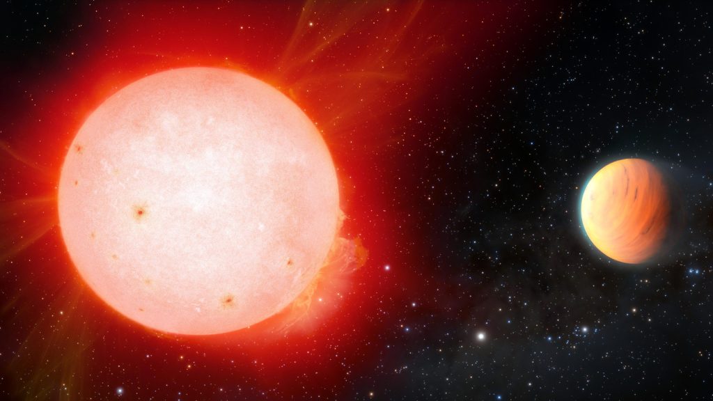 Un planeta gigante y esponjoso que orbita una fría estrella enana roja