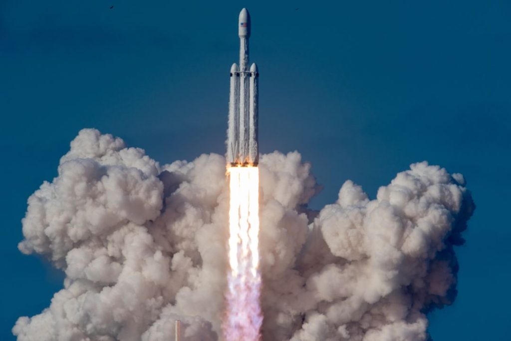A SpaceX Falcon Heavy rocket takes off from NASA